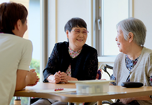 Senior citizens studying Kumon